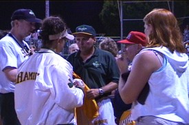 Jim Brackin, Mike Gage and several Shamrock players speak with Olympic Head Coach Ralph Raymond